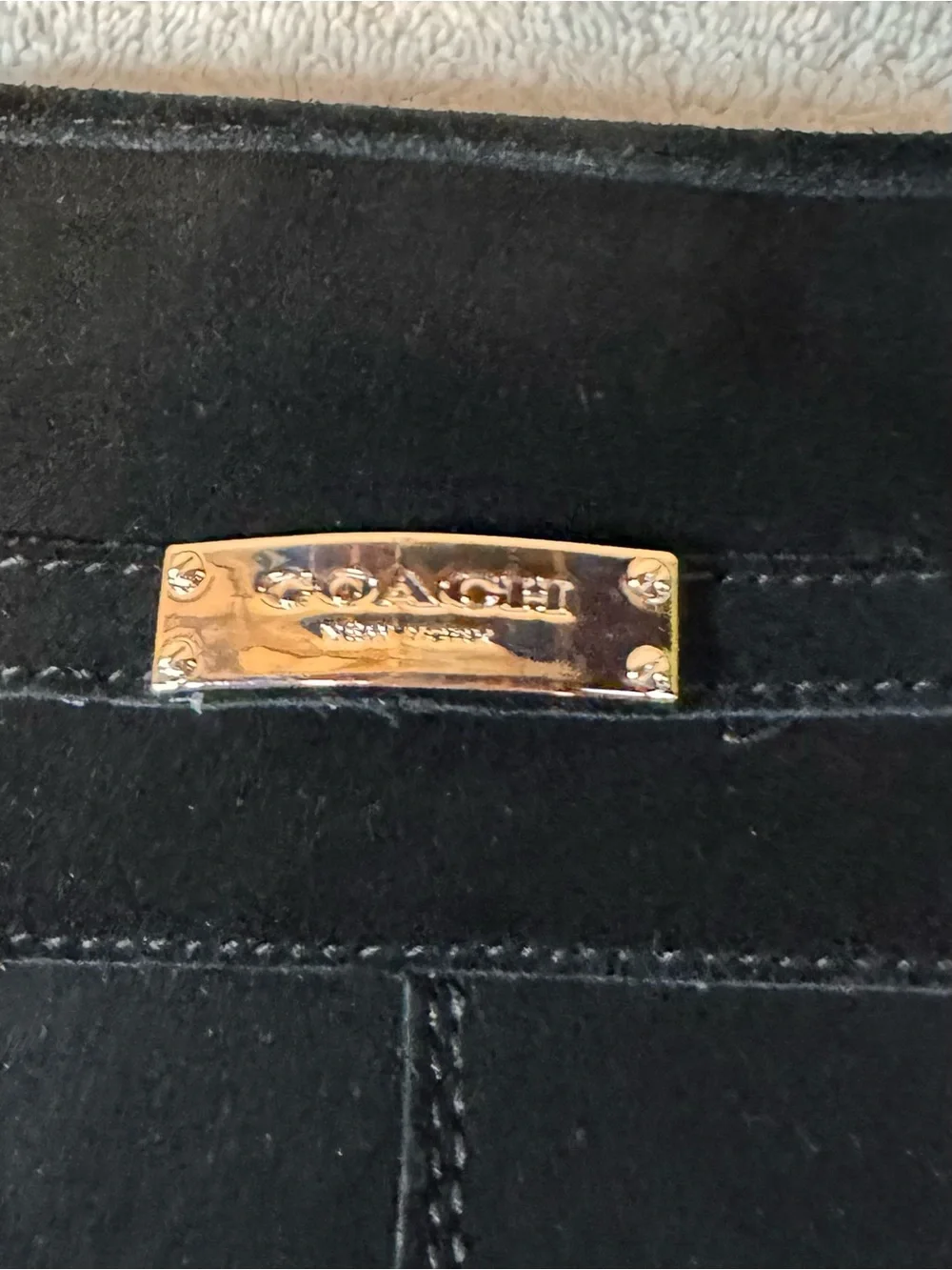 Coach sleek black